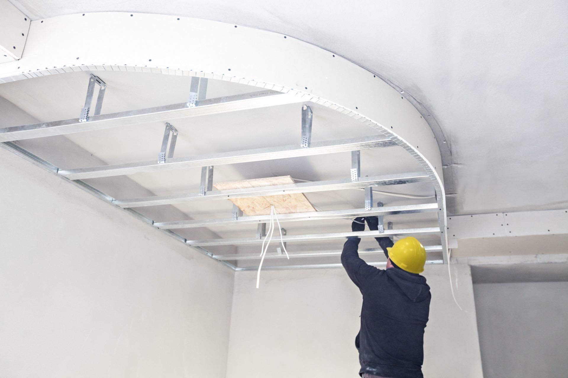 contractor working on a ceiling in a resturant out in hamilton ontario